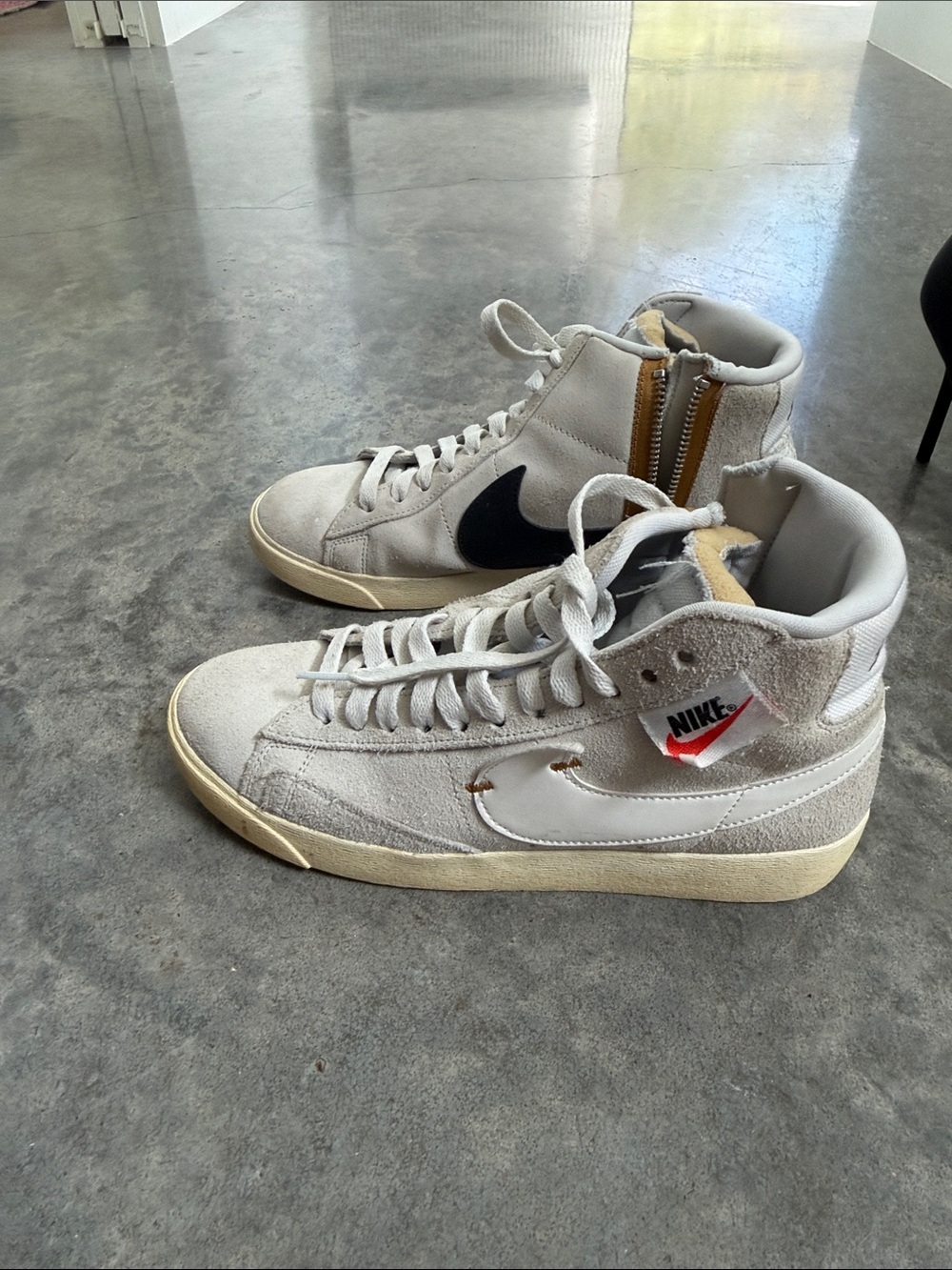 Nike High-Top Sneakers in Light Gray with Black Swoosh and Cream Sole